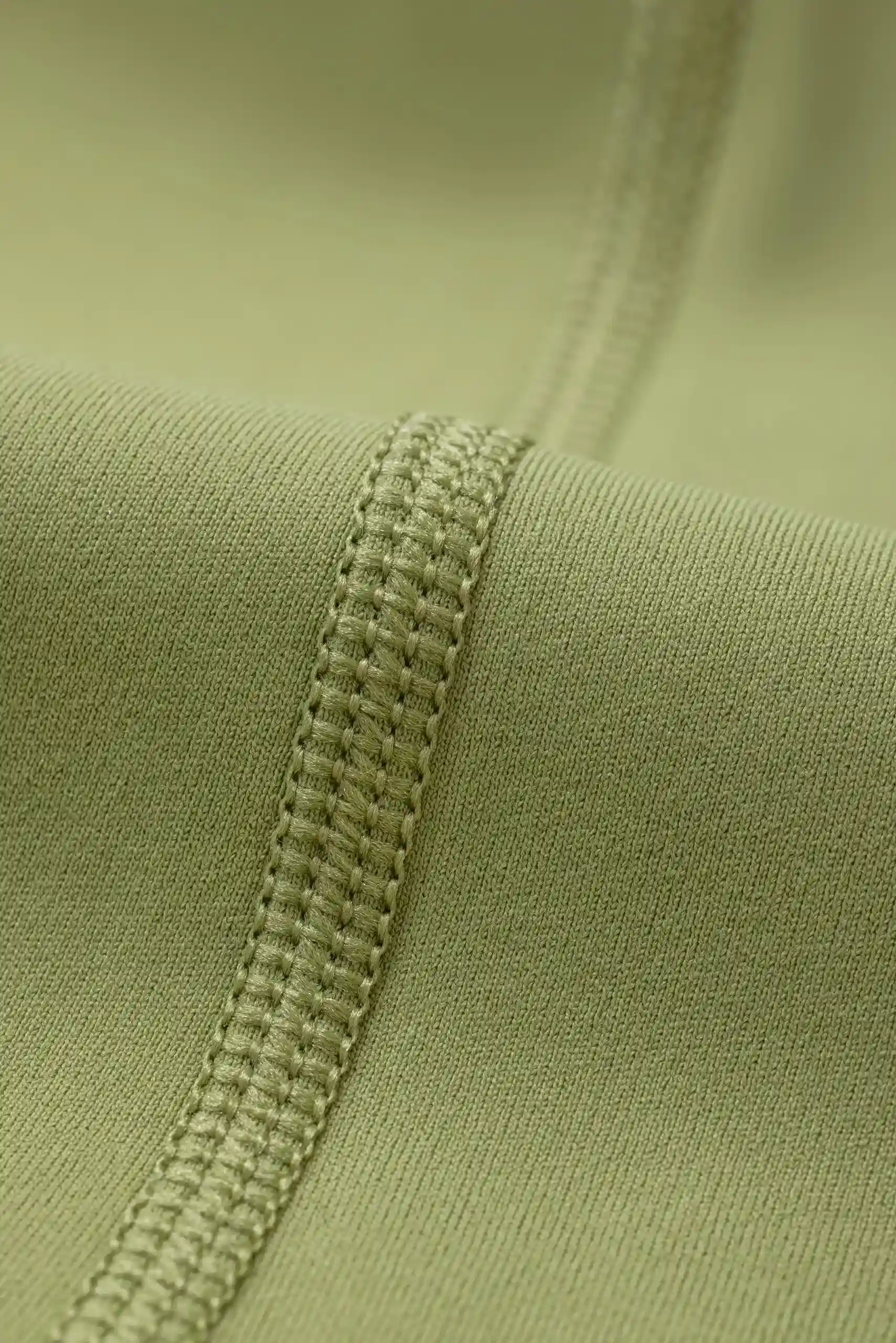 Close-up of high-quality stitching on CozyActive yoga wear.